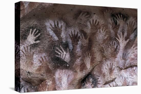 Prehistoric art : cave with hand prints Cave of the Hands-null-Stretched Canvas