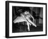 Premier Ballerina Semionova Tying Her Toe Shoe Before a Performance at the Great Theater-Margaret Bourke-White-Framed Photographic Print