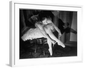 Premier Ballerina Semionova Tying Her Toe Shoe Before a Performance at the Great Theater-Margaret Bourke-White-Framed Photographic Print