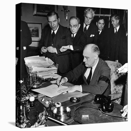 Pres. Franklin D. Roosevelt Signing Declaration of War Following Japanese Bombing of Pearl Harbor-Thomas D^ Mcavoy-Stretched Canvas