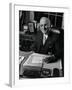 Pres. Harry S. Truman Seated at His Desk in the White House, Family Photographs on Table Behind Him-Gjon Mili-Framed Photographic Print