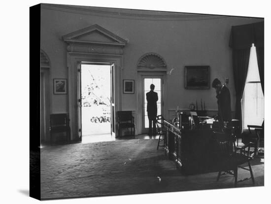 Pres. John F. Kennedy and Attorney Gen. Robert F. Kennedy Conferring in the Oval Office-null-Stretched Canvas