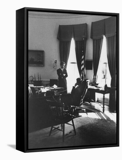 Pres. John F. Kennedy and Attorney Gen. Robert F. Kennedy Conferring in the Oval Office-null-Framed Stretched Canvas