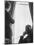 Pres. John F. Kennedy on Telephone While Brother, Attorney General Robert F. Kennedy Stands Nearby-Art Rickerby-Mounted Photographic Print
