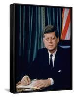 Pres. John F. Kennedy Sitting at His Desk, with Flag in Bkgrd-Alfred Eisenstaedt-Framed Stretched Canvas