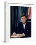 Pres. John F. Kennedy Sitting at His Desk, with Flag in Bkgrd-Alfred Eisenstaedt-Framed Premium Photographic Print