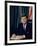 Pres. John F. Kennedy Sitting at His Desk, with Flag in Bkgrd-Alfred Eisenstaedt-Framed Premium Photographic Print