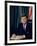 Pres. John F. Kennedy Sitting at His Desk, with Flag in Bkgrd-Alfred Eisenstaedt-Framed Photographic Print