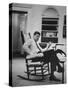 Pres. John F. Kennedy Sitting in Rocking Chair-null-Stretched Canvas