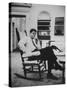 Pres. John F. Kennedy Sitting in Rocking Chair-null-Stretched Canvas