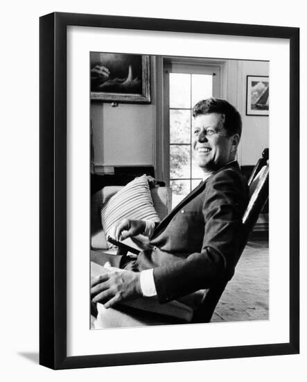 Pres Kennedy Sits in Rocking Chair in Oval Office of White House on 46th Birthday, May 29, 1963-null-Framed Photo