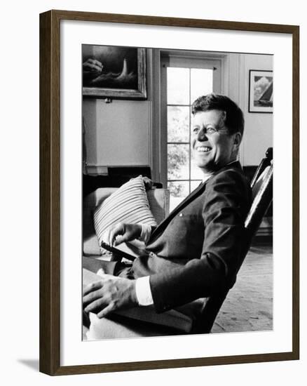 Pres Kennedy Sits in Rocking Chair in Oval Office of White House on 46th Birthday, May 29, 1963-null-Framed Photo