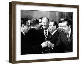 Pres Richard Nixon and Henry Kissinger Clink Champagne Glasses to Toast-null-Framed Photo