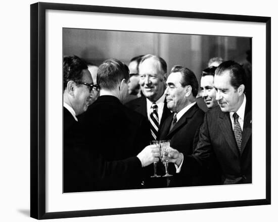 Pres Richard Nixon and Henry Kissinger Clink Champagne Glasses to Toast-null-Framed Photo