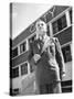 President and Director of Coty Perfumes Andre Lavault in Front of Building Holding Cigarette-Hans Wild-Stretched Canvas