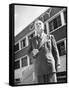 President and Director of Coty Perfumes Andre Lavault in Front of Building Holding Cigarette-Hans Wild-Framed Stretched Canvas