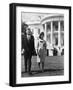 President and Mrs. John F. Kennedy Walking on the South Lawn of the White House on April 16, 1962-null-Framed Photo