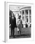 President and Mrs. John F. Kennedy Walking on the South Lawn of the White House on April 16, 1962-null-Framed Photo