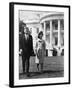 President and Mrs. John F. Kennedy Walking on the South Lawn of the White House on April 16, 1962-null-Framed Photo