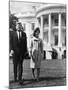 President and Mrs. John F. Kennedy Walking on the South Lawn of the White House on April 16, 1962-null-Mounted Photo