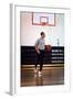 President Barack Obama Dribbles the Basketball at Fort Mcnair in Washington D.C. on May 9, 2009-null-Framed Photo