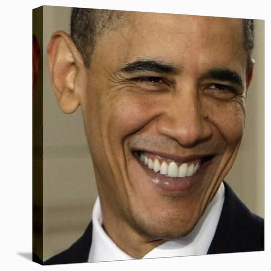 President Barack Obama During the Signing Ceremony for the Health Care Bill-null-Stretched Canvas