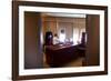 President Barack Obama Holds a Conference Call with Advisors from His Office Aboard Air Force One-null-Framed Photo