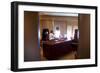 President Barack Obama Holds a Conference Call with Advisors from His Office Aboard Air Force One-null-Framed Premium Photographic Print