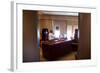 President Barack Obama Holds a Conference Call with Advisors from His Office Aboard Air Force One-null-Framed Photo