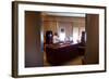 President Barack Obama Holds a Conference Call with Advisors from His Office Aboard Air Force One-null-Framed Photo