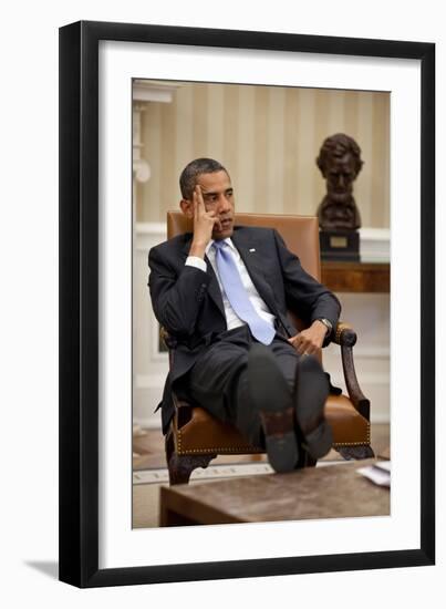 President Barack Obama Listens During to Advisors in the Oval Office-null-Framed Premium Photographic Print
