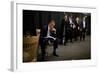 President Barack Obama Reviews Notes as His Staff Waits before an Event in Denver, Colorado-null-Framed Photo