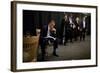 President Barack Obama Reviews Notes as His Staff Waits before an Event in Denver, Colorado-null-Framed Photo