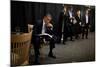 President Barack Obama Reviews Notes as His Staff Waits before an Event in Denver, Colorado-null-Mounted Photo