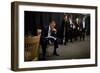 President Barack Obama Reviews Notes as His Staff Waits before an Event in Denver, Colorado-null-Framed Premium Photographic Print