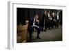 President Barack Obama Reviews Notes as His Staff Waits before an Event in Denver, Colorado-null-Framed Premium Photographic Print