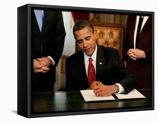 President Barack Obama Signs His First Act as President in the President's Room, January 20, 2009-null-Framed Stretched Canvas