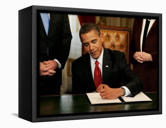 President Barack Obama Signs His First Act as President in the President's Room, January 20, 2009-null-Framed Stretched Canvas