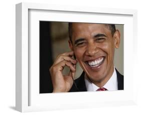 President Barack Obama Smiles as He Participates in a Joint News Conference in the White House-null-Framed Photographic Print