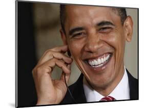 President Barack Obama Smiles as He Participates in a Joint News Conference in the White House-null-Mounted Photographic Print