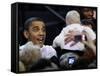 President Barack Obama Smiles at a Baby During His Event at the University of Iowa in Iowa City-null-Framed Stretched Canvas
