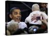 President Barack Obama Smiles at a Baby During His Event at the University of Iowa in Iowa City-null-Stretched Canvas