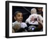 President Barack Obama Smiles at a Baby During His Event at the University of Iowa in Iowa City-null-Framed Photographic Print