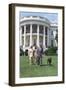 President Bill Clinton, Hillary and Chelsea Clinton, and Buddy the Dog on the South Lawn-null-Framed Photo