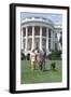 President Bill Clinton, Hillary and Chelsea Clinton, and Buddy the Dog on the South Lawn-null-Framed Photo