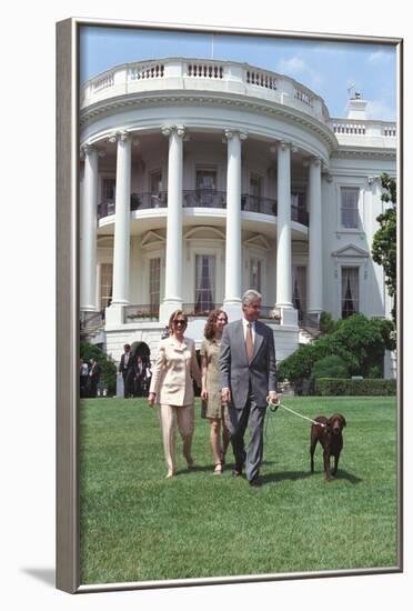 President Bill Clinton, Hillary and Chelsea Clinton, and Buddy the Dog on the South Lawn-null-Framed Photo