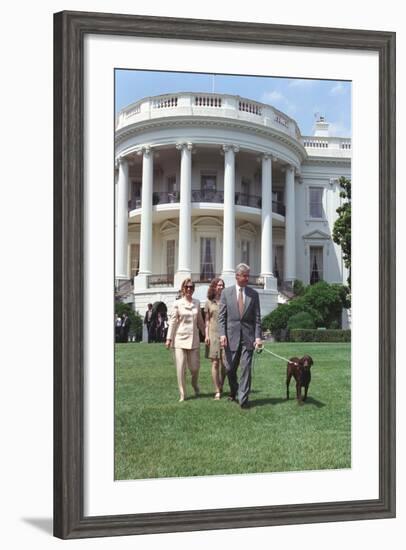 President Bill Clinton, Hillary and Chelsea Clinton, and Buddy the Dog on the South Lawn-null-Framed Photo