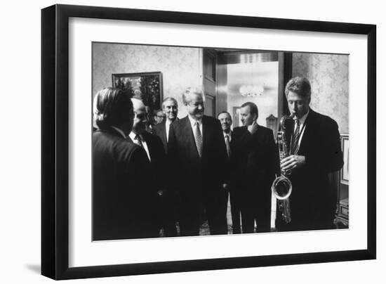 President Bill Clinton Plays the Saxophone Presented to Him by Russian President Boris Yeltsin-null-Framed Premium Photographic Print