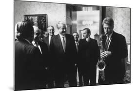 President Bill Clinton Plays the Saxophone Presented to Him by Russian President Boris Yeltsin-null-Mounted Photo