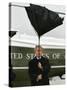 President Bush Jokingly Holds His Wind-Blown Umbrella Upright-null-Stretched Canvas